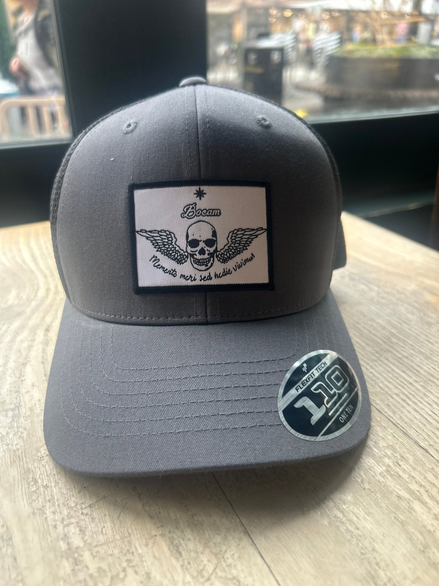 BOCAM 110 Two - Tone Grey/Melange Trucker Cap – Winged Skull “Memento Mori Sed Hodie Vivimus” Trucker cap streetwear by Bocam Gallery – graphic design Baseball caps